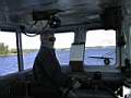 23-1000_islands_pilot_in_wheel_house.jpg